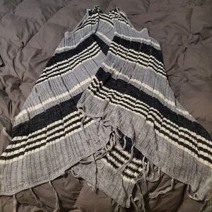LONG sleeveless cardigan with tassels